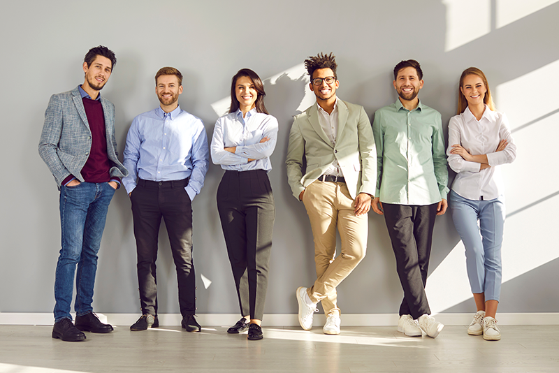 Employees Leaning Against Wall