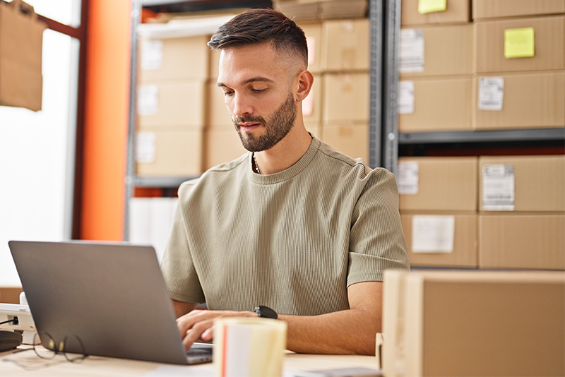 Man Working on Shipping Packages